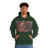 Man wearing dark green hoodie with colorful abstract art print on front and sleeve