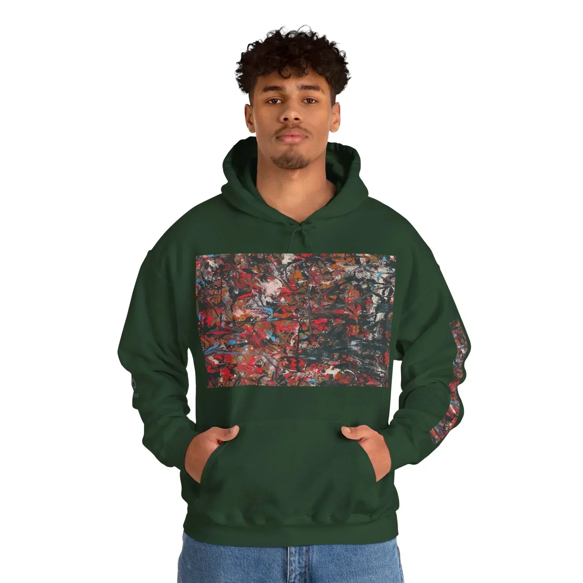 Man wearing dark green hoodie with colorful abstract art print on front and sleeve